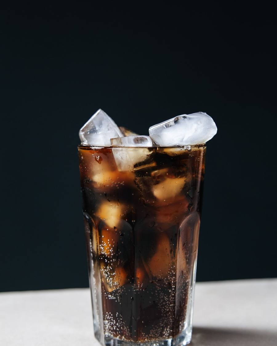 Glass of soda with ice cubes