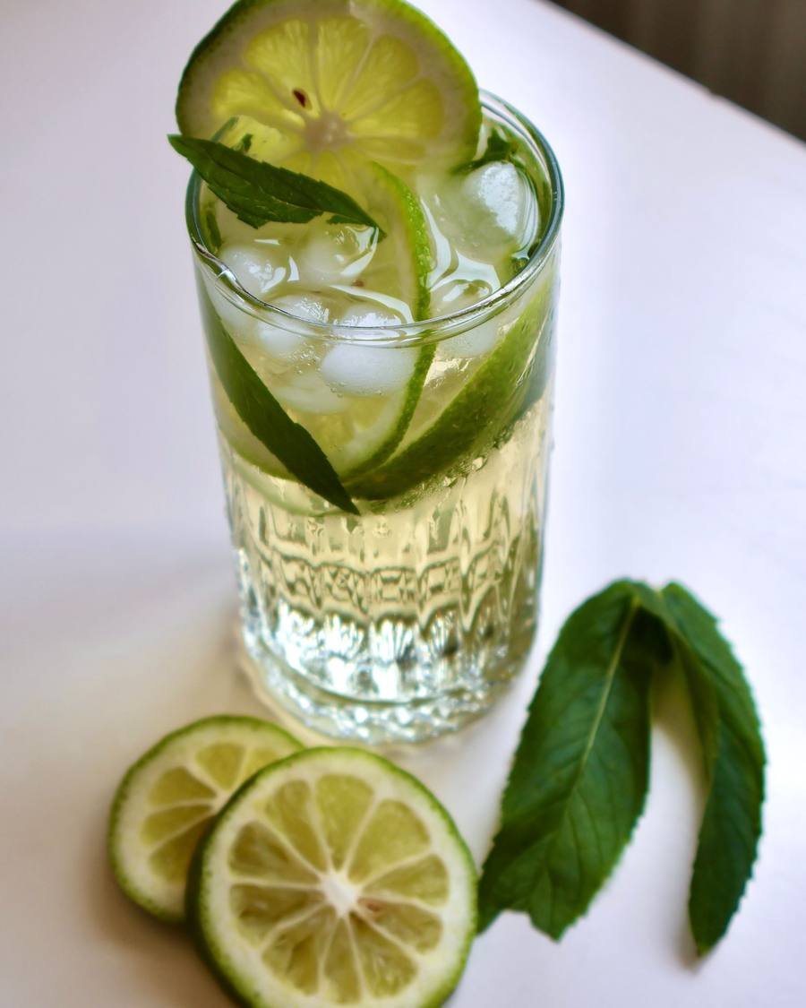 Homemade lemonade with lime, mint and ice